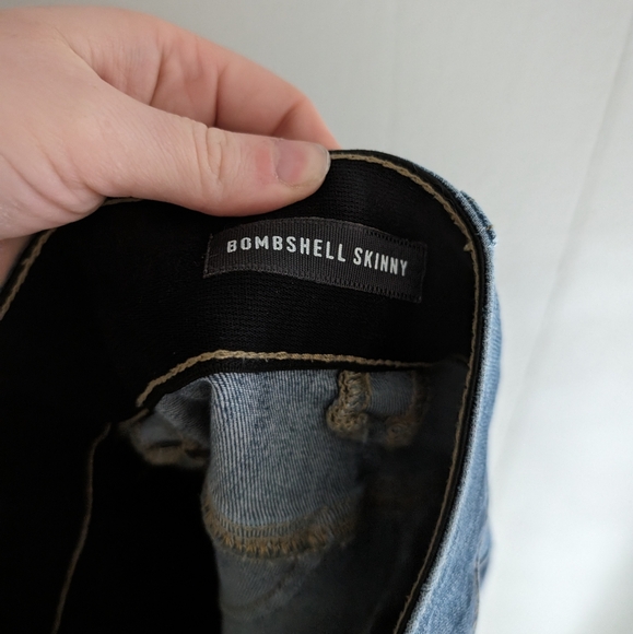 Torrid Bombshell Destructed Skinny Jeans - Picture 8 of 9